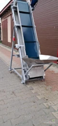Podajnik , taśmociąg . Masywna konstrukcja, wysokość podnoszenia 180 cm - 200 cm.długość 250 cm. szerokość taśmy 40 cm. Zabudowany...